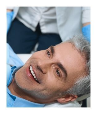 Man with flawless smile after veneers