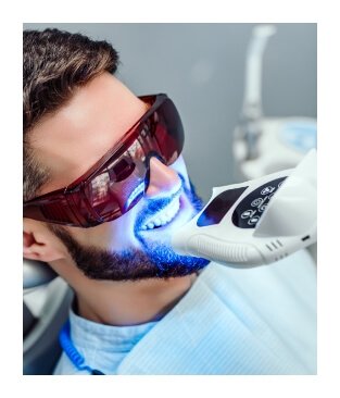 Man receiving professional teeth whitening