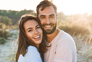 happy couple representing benefits of dental implants in Rio Rancho