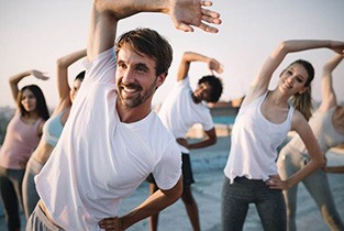 man exercising representing benefits of dental implants in Rio Rancho