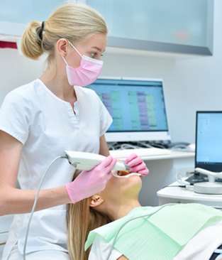 patient receiving an intraoral scan