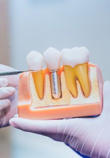 Woman in dental chair with toothache in Corrales  