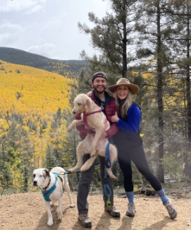 Doctor Ranjbaran and his wife and dogs on a hike