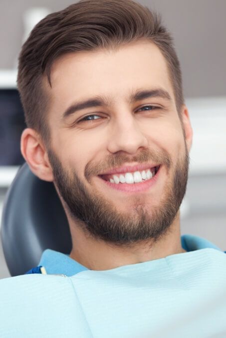 Man smiling after preventive dentistry visit