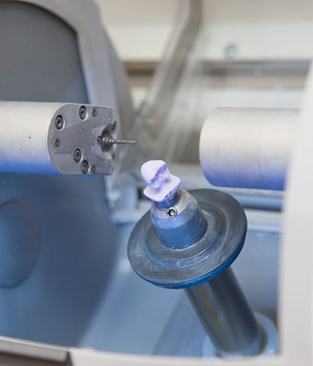 Block of dental ceramic inside CAM machine