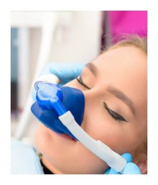 Dental patient receiving nitrous oxide sedation dentistry