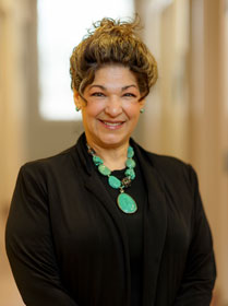 Dental office manager Judy Gutierrez