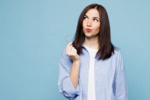 Woman wondering how long Invisalign will take